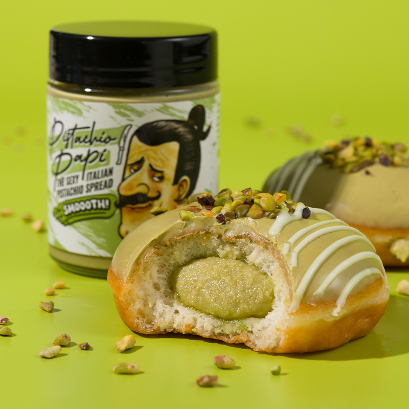 A Papi doughnut beside the jar